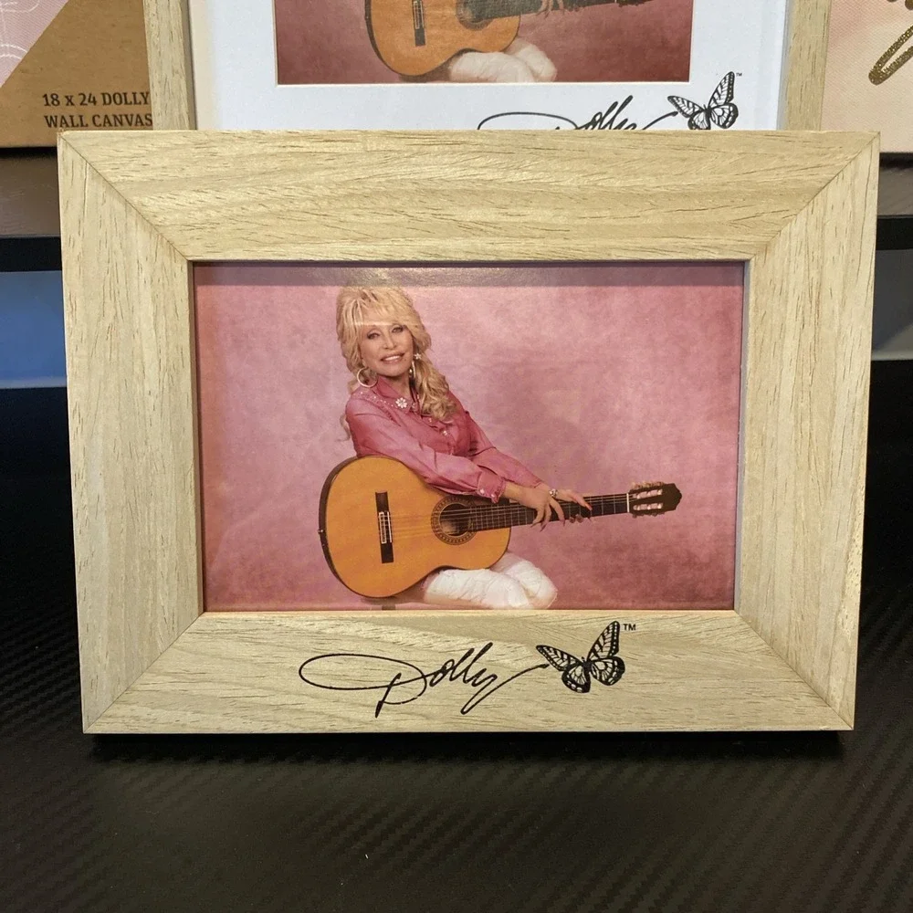 New 2  Dolly Parton framed pictures